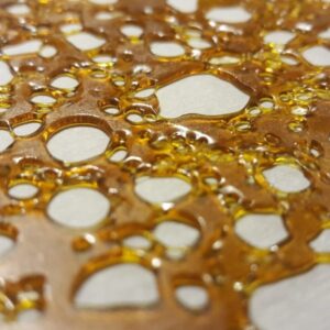 Platinum OG shatter, indica cannabis shatter, premium cannabis concentrate, high THC shatter, glassy cannabis extract, potent cannabis shatter, discreet cannabis shipping, adult cannabis concentrate, Cannabis Exotic Dispensary, lab-tested cannabis shatter